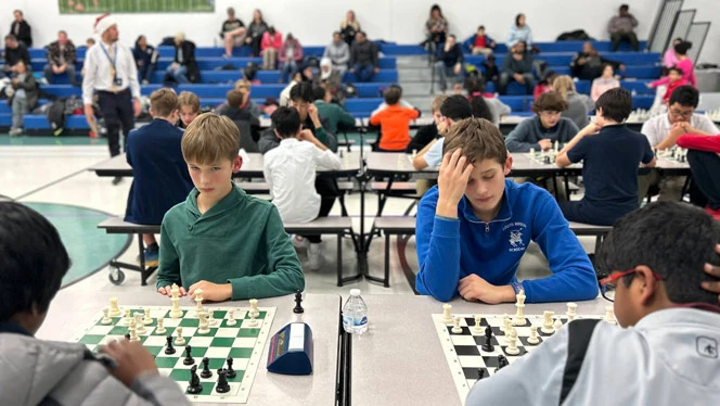 Students playing chess