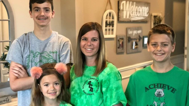 Principal Moore with her children