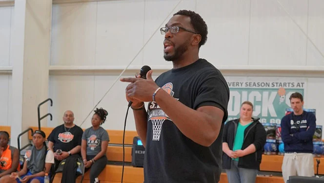 Gray speaking at the event.