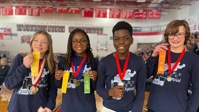 4 students with awards from Allendale Tournament