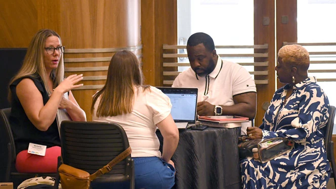 National Heritage Academies: North Dayton School of Discovery working together during session.