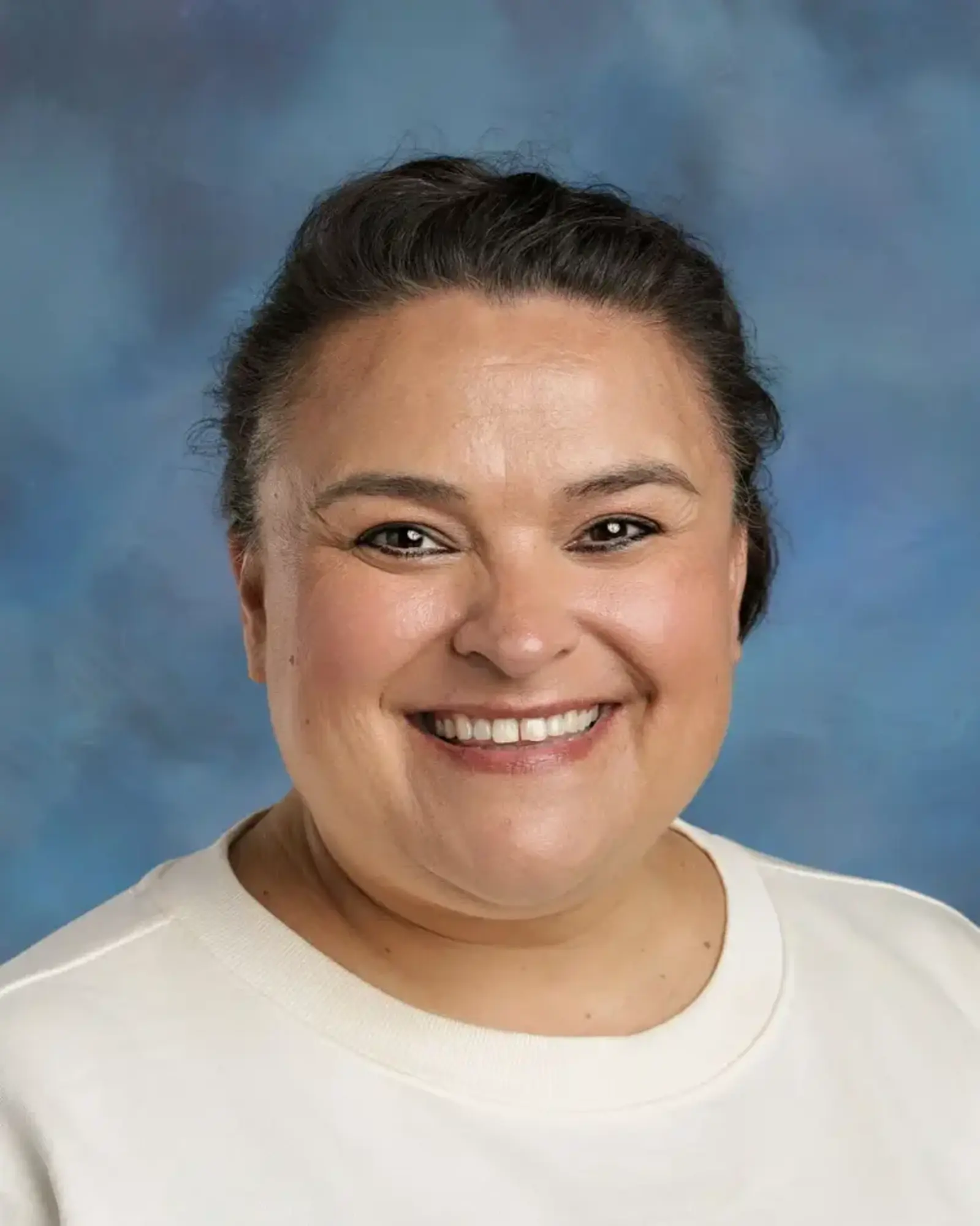 a woman smiling at camera