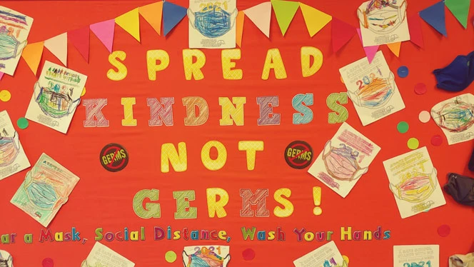 Cutout of paper that reads Spread Kindness Not Germs. Cutout of paper that reads Spread Kindness Not Germs.