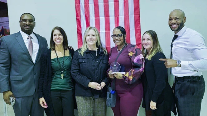 K-8 School in Warren: Great Oaks Dean Yevrah Johnson wins Dean of Excellence award.