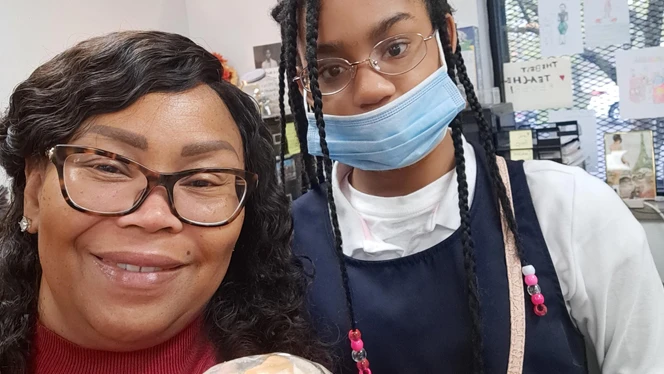Lisa Jackson-Clayborn and student.