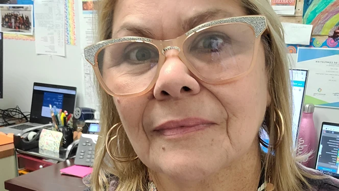Aida Colon smiling.