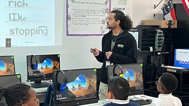 DJ Williams works with students