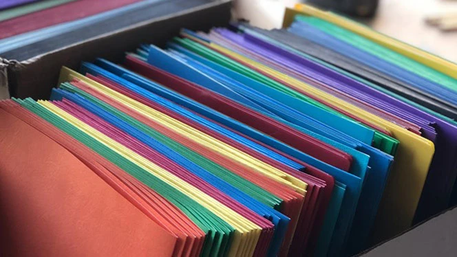 A box of folders. A box of folders.