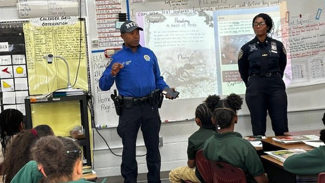 NYPD speaking to students.