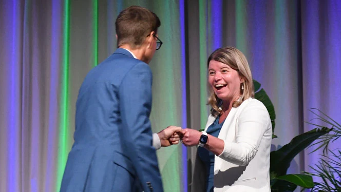 National Heritage Academies: Canton Charter Principal accepts Eagle Award from NHA President and CLO Dr. Sheltrown.