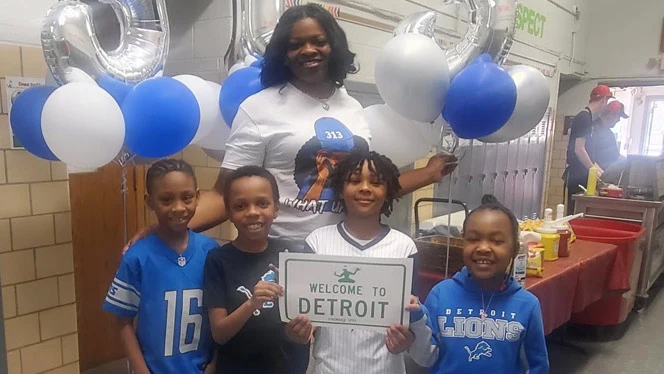 Students wearing Detroit apparel.