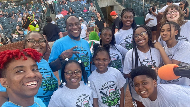K-8 School in Greensboro: Gate City Charter Academy choir sang the National Anthem at the Greensboro Grasshoppers minor league baseball game.