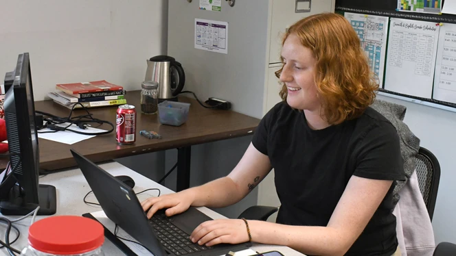 Teacher at computer