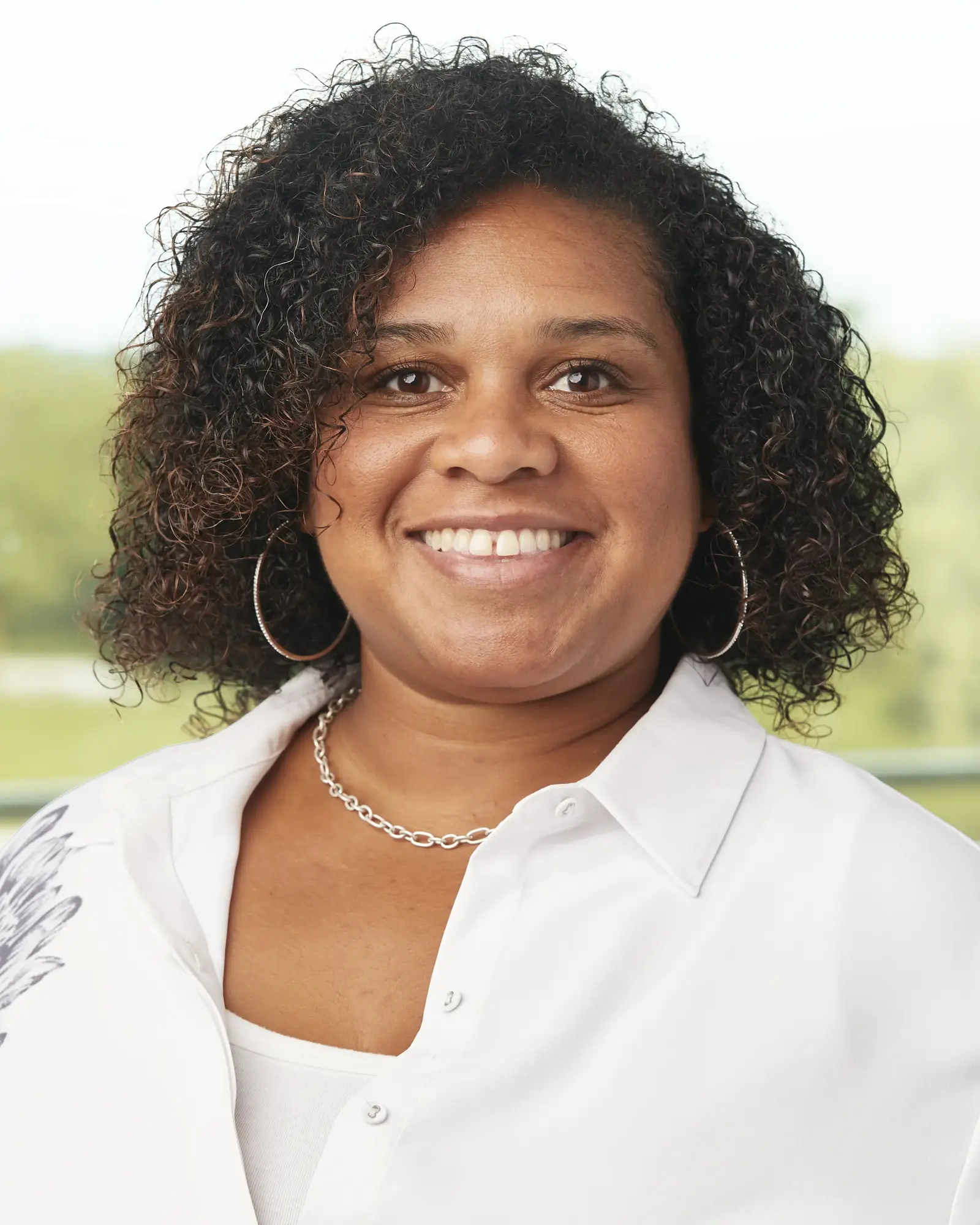 a woman smiling at camera
