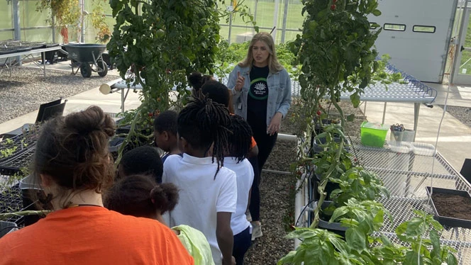 River City students touring Kids Food Basket