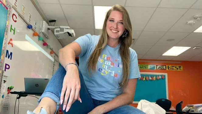 K-8 School in Apex NC: Dean Angel posing in classroom