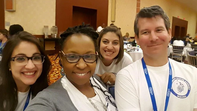 Amanda Brown posing with her colleagues