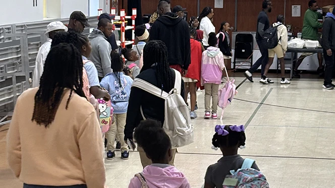K-8 School in Euclid: Pinnacle Academy father's and students participate in Father Walk event.