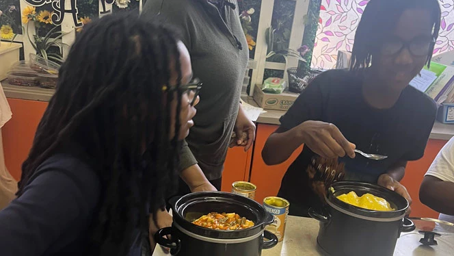 Detroit Merit students cooking