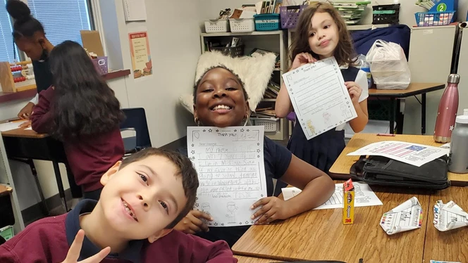 Students with their letters