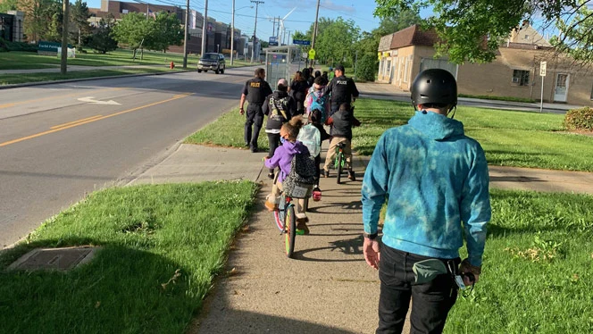 students riding bikes