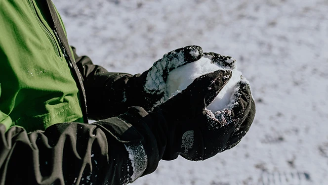 Charter School in Grand Rapids: Student holding a snowball.