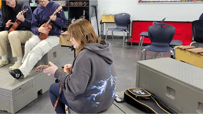 K-8 School in Colorado Springs CO: Mountain View students play ukulele.
