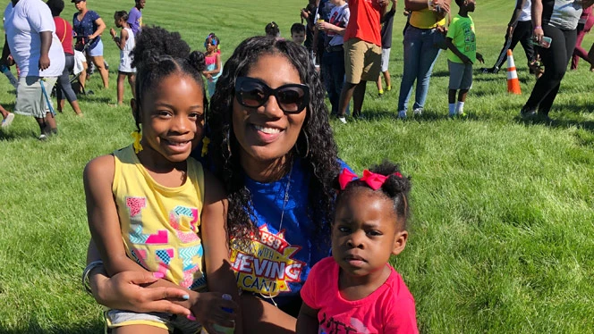 Deonna Washington with two children. Deonna Washington with two children.