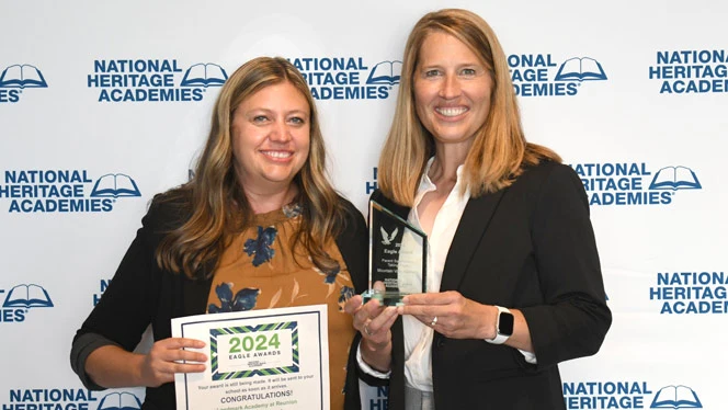 National Heritage Academies: Leaders from Landmark Academy pose for a photo after winning an Eagle Award.