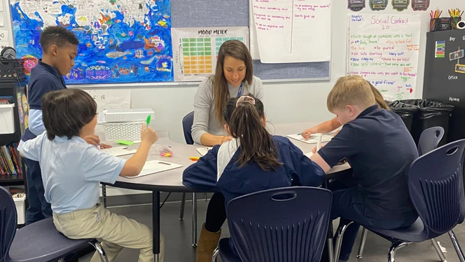 Melissa Mendez working with students