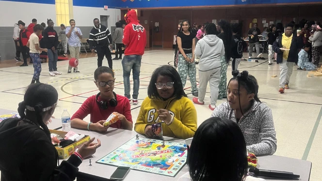 Students playing Monopoly
