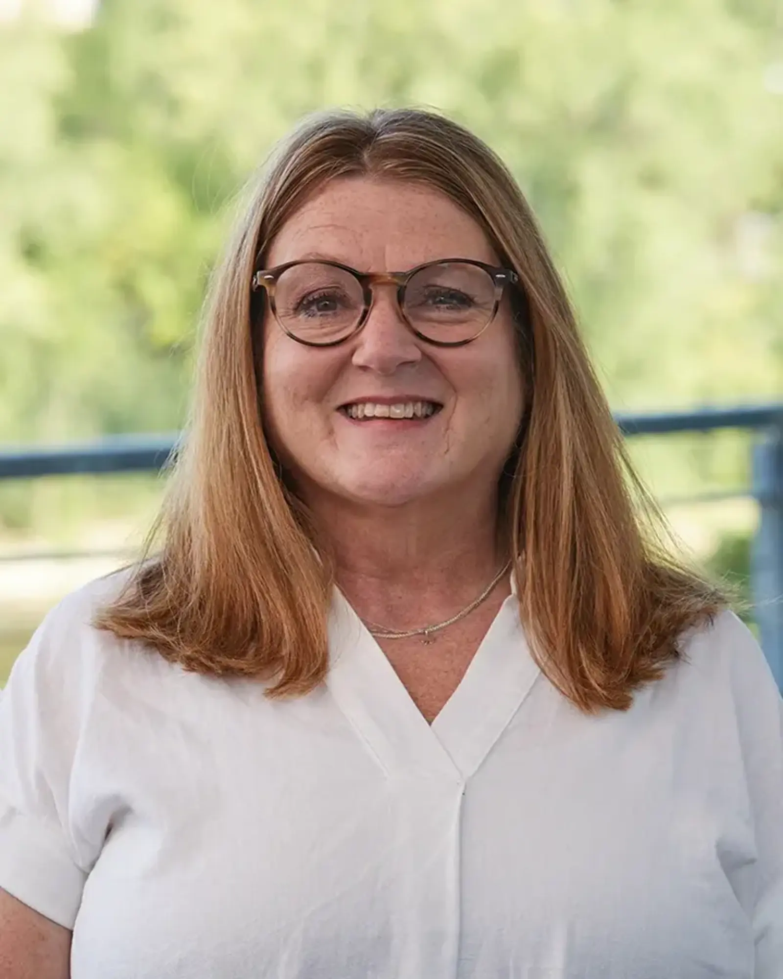 a woman in a white shirt