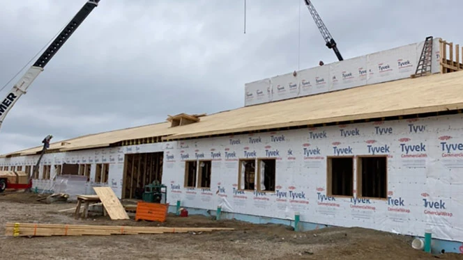 Outside of Mill Creek building during construction
