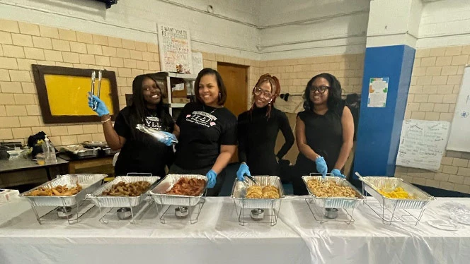 Volunteers serving brunch