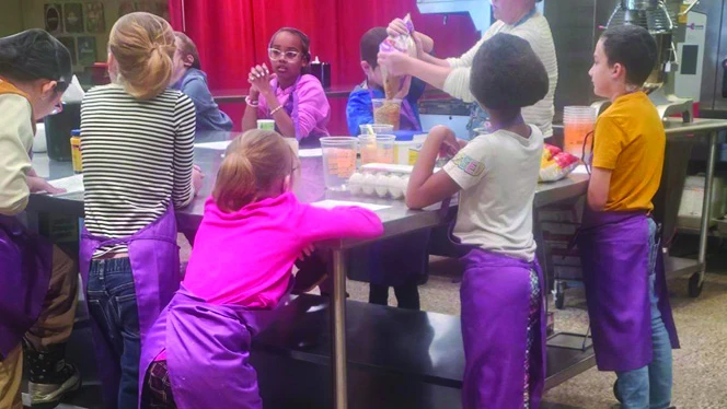 Y5-8 School in Wyoming: Vanguard Charter Academy third and fourth graders make healthy snacks in The Viking Culinary Club.