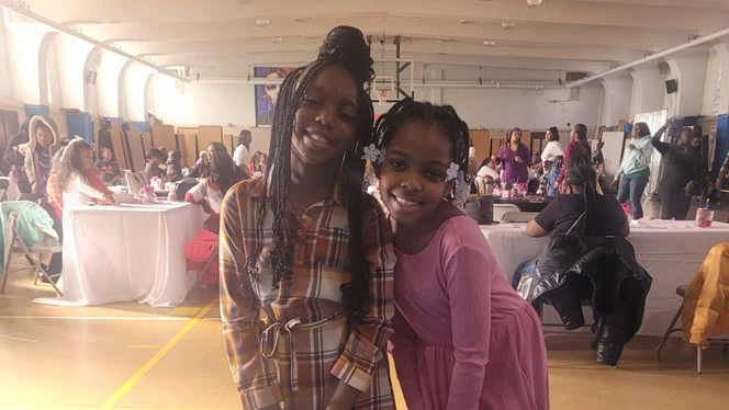 Two students posing at brunch