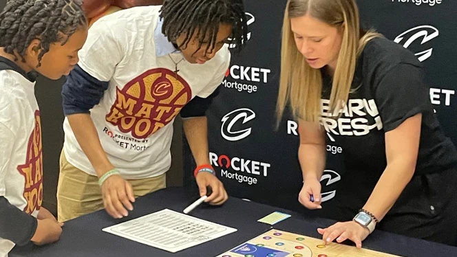 Pinnacle students playing NBA Math Hoops board game