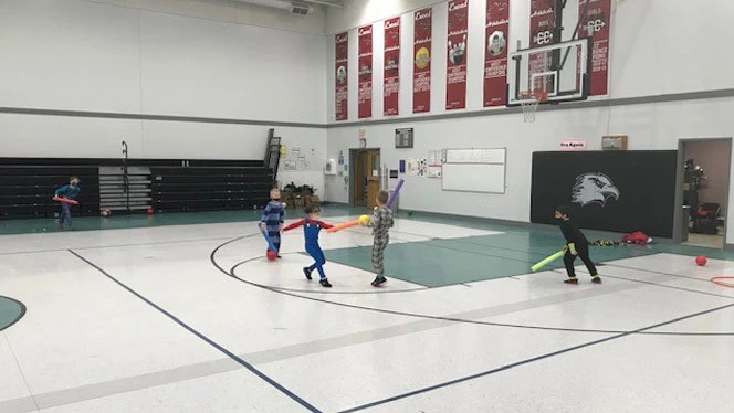 Excel students enjoying Gym class