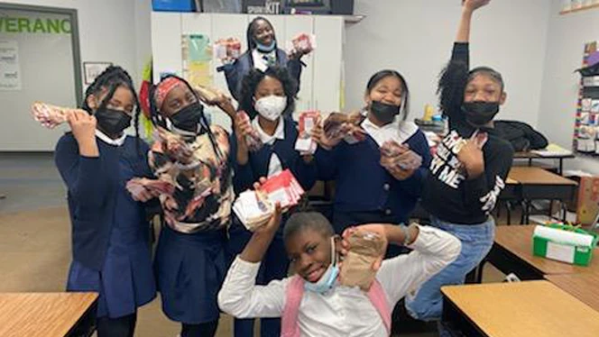 Flagship students help pack donations