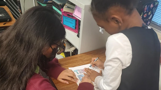 Student coloring picture