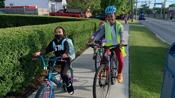 students riding bikes