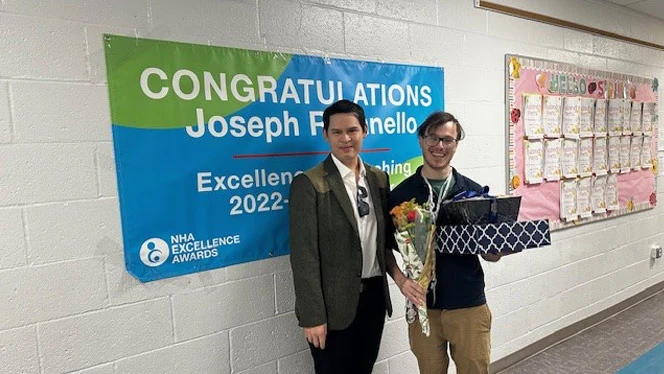K-8 School in Brooklyn, NY: Racanello receiving Excellence in Teaching award.