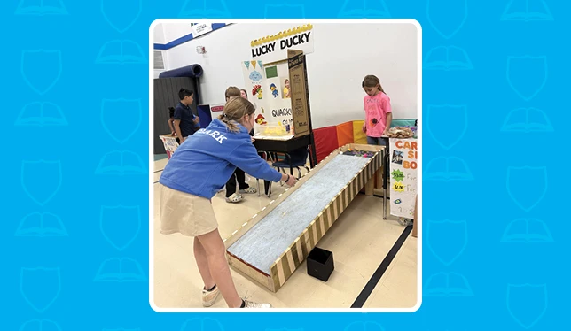 K-8 School in Mint Hill: Queen's Grant fourth graders host their annual Economic Fair.
