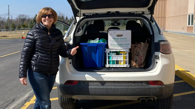 Back of a vehicle full of supplies.