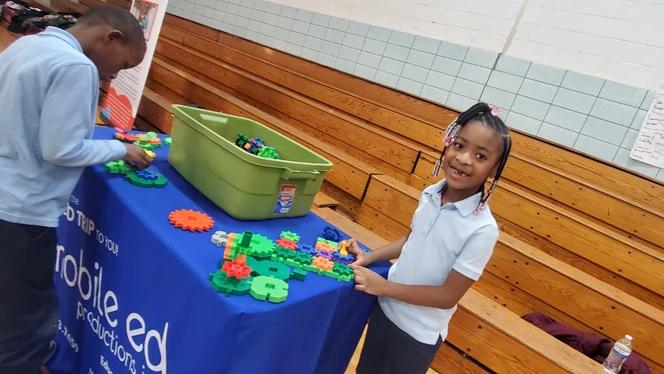 Students building with blocks.