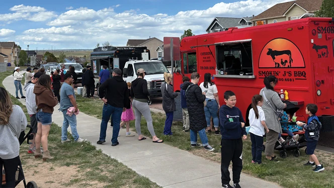 K-8 School in Colorado Springs: Mountain View Academy families eat at food trucks during Yeti For Summer.