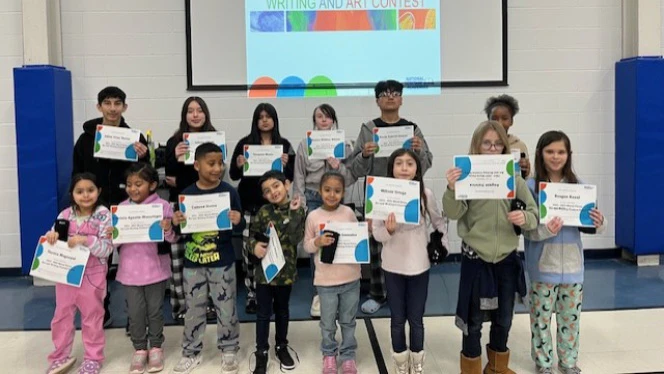 Y5-8 School in Grand Rapids: Vista Charter Academy scholars celebrate Moral Focus challenges.