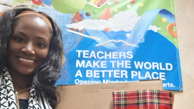 Teacher with laptop.