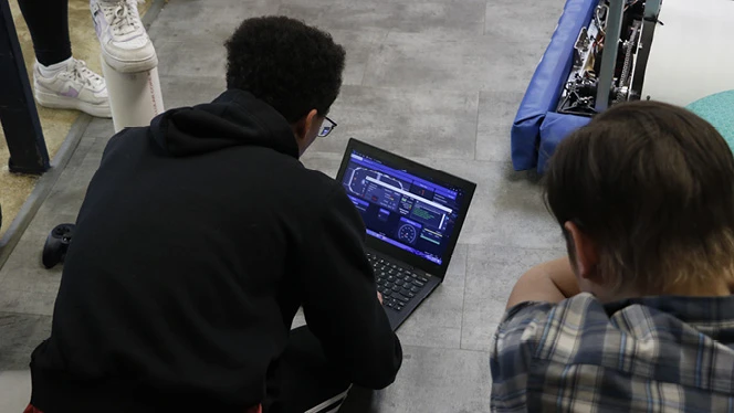 High School in Kentwood: Grand River Preparatory High School's Robotics team builds a robot.