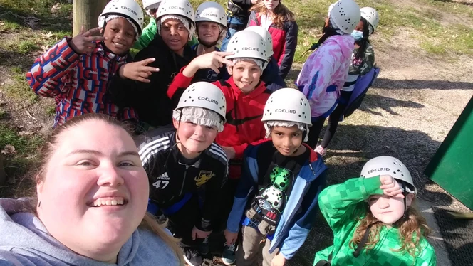 KeriAnn Throne taking a selfie with students. KeriAnn Throne taking a selfie with students.